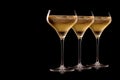 Set of crystal-clear flute glass of champagne isolated on black background Royalty Free Stock Photo