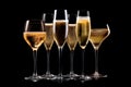 Set of crystal-clear flute glass of champagne isolated on black background Royalty Free Stock Photo