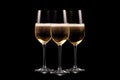 Set of crystal-clear flute glass of champagne isolated on black background Royalty Free Stock Photo