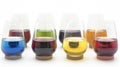 A set of crystal stemless wine gles each with a different colored base adding a vibrant touch to any tabletop Royalty Free Stock Photo