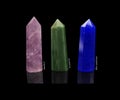 Set of crystals stones amethyst, aventurine, blue sandstone isolated on black