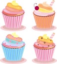 set of four delicious bright of cupcakes