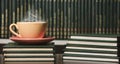 table with yellow orange cup of hot coffee, with books. Royalty Free Stock Photo