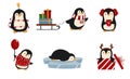 A set of cute cartoon style Christmas penguins. Royalty Free Stock Photo