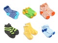 Set of cute colorful child socks on white background, top view. Royalty Free Stock Photo