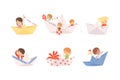 Set of cute little kids floating on paper boats cartoon vector illustration