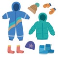 Set of cute winter children clothes in doodle cartoon style. Vector clip art for design. Royalty Free Stock Photo
