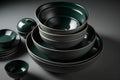 Set of dark green ceramic bowls. Deep soup dishes in moody dark light. Kitchenware shining porcelain meal green pottery Royalty Free Stock Photo