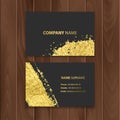 Set of dark visit cards decoration with gold brushes, located on a wooden substrate vector eps 10