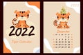 Set - December 2022 calendar and cover. Cute tiger cub with a Christmas tree, toys and garlands. Year of the Tiger in Chinese or