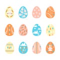 Set of decorated Easter eggs isolated on white background. Paschal symbols covered with various ornaments. Flat