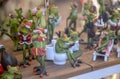 Set of decoration ceramic frogs in various funny poses for home and garden