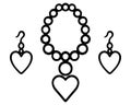 Set of decorations. A pair of heart earrings and a beaded necklace with a heart pendant Royalty Free Stock Photo