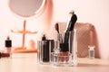 Set of decorative cosmetic products for makeup on dressing table Royalty Free Stock Photo