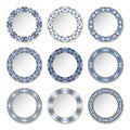 Set of decorative plates with a circular blue pattern and gold contour