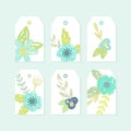 Set of decorative tags with cute flowers. Royalty Free Stock Photo