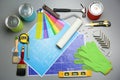 Set of decorator`s tools and project drawings Royalty Free Stock Photo
