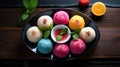 Set of delicious colorful mochi. Fresh Asian Cuisine on Wooden Table