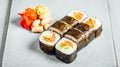 Set of delicious fresh sushi rolls served on a white plate Royalty Free Stock Photo