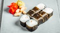 Set of delicious fresh sushi rolls served on a white plate Royalty Free Stock Photo