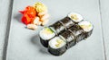 Set of delicious fresh sushi rolls served on a white plate Royalty Free Stock Photo