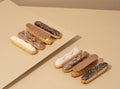 set of delicious glazed donuts in a variety of flavors, arranged on a cardboard paper in an inviting display