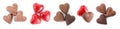Set with delicious heart shaped chocolate candies on white background, top view. Banner design Royalty Free Stock Photo
