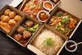 Set of delivery asian food with rice, salads, sauces and meat. Generative AI Royalty Free Stock Photo