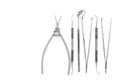 Set of dentists tools including round mirror on white background top view copyspace Royalty Free Stock Photo