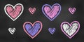 Set of Design Elements Hearts of Different Colors Isolated on Chalkboard. Realistic Chalk Drawn Sketch Royalty Free Stock Photo