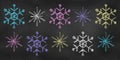 Set of Design Elements Snowflakes of Different Colors Isolated on Chalkboard Backdrop. Realistic Chalk Drawn Sketch