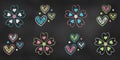 Set of Design Elements White, Blue, Green, Red, Yellow Flowers and Hearts Isolated on Chalkboard Backdrop. Realistic Chalk Drawn Royalty Free Stock Photo