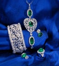 Set of the diamond and emerald jewelry