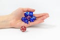set of Dice for fantasy, dnd, rpg in hand,  on white background. selective focusing Royalty Free Stock Photo