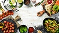 Set of diet dishes. Assortment of food on white wooden background. Top view.