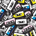 A set of different audio cassettes. Seamless background in retro style. Colored vector illustration