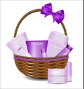 Set of different beauty products in a wicker basket.