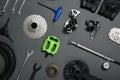 Set of different bicycle tools and parts on background, flat lay Royalty Free Stock Photo