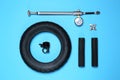 Set of different bicycle tools and parts on blue background, flat lay Royalty Free Stock Photo