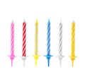 Set with different birthday candles on white