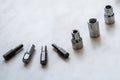 Set of different bits for screwdriver replaceable head