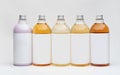 Set of different bottles for beauty, hygiene and health on a white background with reflection