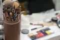 Set of different brushes in a case. Make-up artist draws on the table Royalty Free Stock Photo