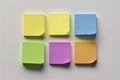 Set of different colored sticky notes on white wall background Royalty Free Stock Photo