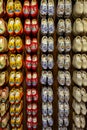 Set of different colorful vintage Dutch wooden clogs on display