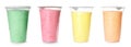 Set of different colorful yummy cotton candy in plastic cups on white