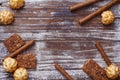 Set of different confectionery sweets on wooden table. Chocolate, waffles, coconut biscuits, cookies.