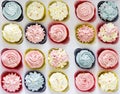 Set of different delicious homemade cupcakes in paper delivery b