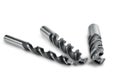 Set of different drill bits on isolated background Royalty Free Stock Photo