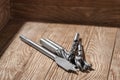 Set of different drill bits on wooden background Royalty Free Stock Photo